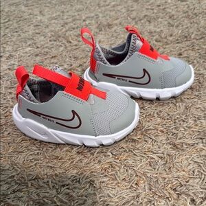 Nike Kids Gray and Red Shoes
